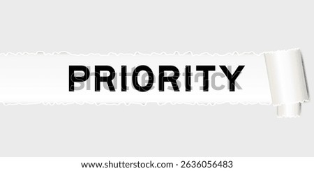 Ripped gray paper background that have word priority under torn part