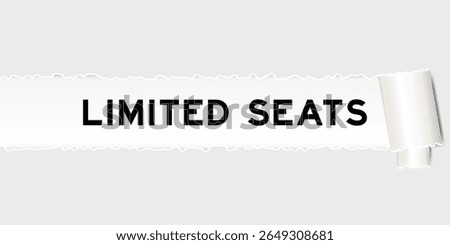 Ripped gray paper background that have word limited seats under torn part