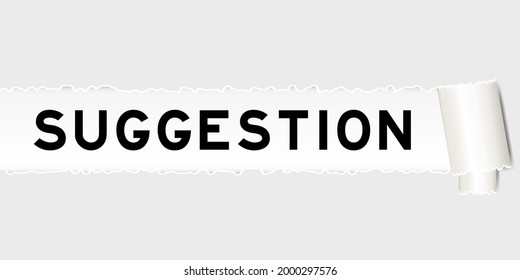 Ripped gray paper that have word suggestion under torned part