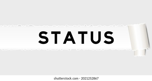 Ripped gray paper that have word status under torned part