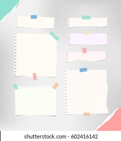 Ripped notebook, copybook, note strips, stuck with colorful sticky, adhesive tape, torn paper in corners