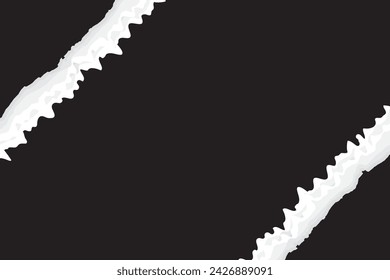 Aufgerissenes Papier auf schwarzem Hintergrund.