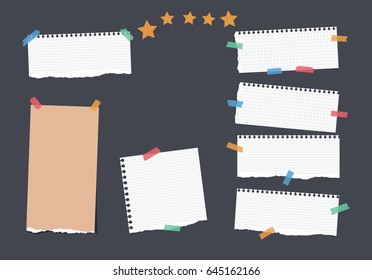 Ripped white, brown note, notebook, copybook, ruled paper strips stuck with colorful sticky tape, stars on black background.