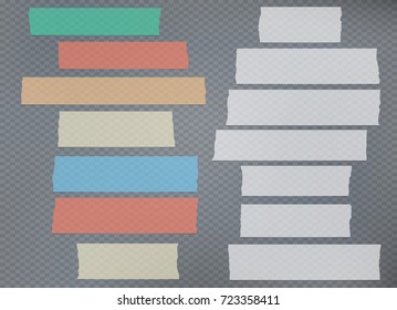 Ripped white and colorful note, adhesive, masking tape, paper strips on gray squared background.