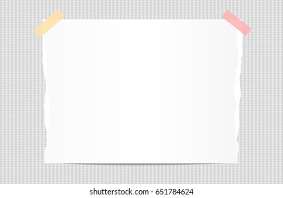 Ripped white note, notebook, copybook paper stuck with sticky tape on squared background.