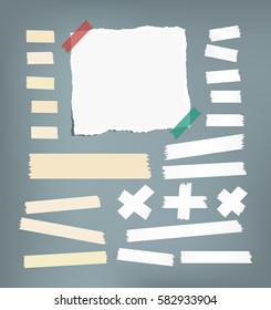 Ripped white notebook, copybook, note paper, sticky, adhesive masking tape stuck on gray background