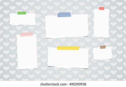 Ripped white notebook, note paper stuck on pattern created of heart shapes.