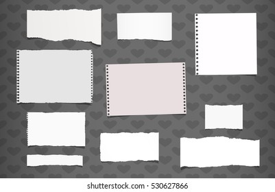 Ripped white notebook, note paper stuck on pattern created of heart shapes