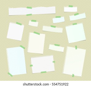 Ripped white ruled note, notebook, copybook paper sheets, strips stuck with colorful sticky tape on brown squared pattern