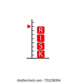 risk assessment concept symbolizing with scale and alphabet cubes showing word risk in red