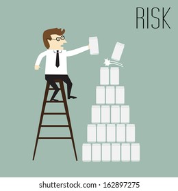 Risk, Businessman trying to put the cans on top