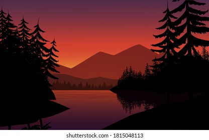River landscape at sunset with mountain and pine trees