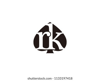 The rk initials logo inside the black shovel