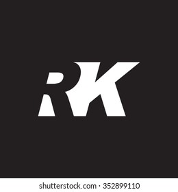 RK negative space letter logo black background