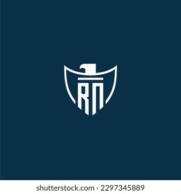 RN initial monogram logo for shield with eagle image vector design