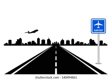 road with airport sign