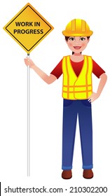 Road construction worker on street with board in hand saying - Work in Progress. 
