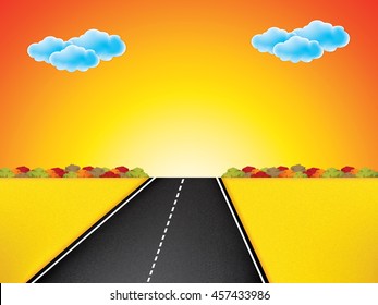 Road in golden yellow field, sunset, clouds on the sky.
