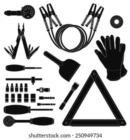 Road Kit Silhouettes Set. Tire Pressure Gauge, Jumper Cables, Insulating Tape, Working Gloves, Emergency Sign, Flashlight, Ice Scraper, Ratchet Set, Screwdriver, Multi-tool. Vector Illustrations