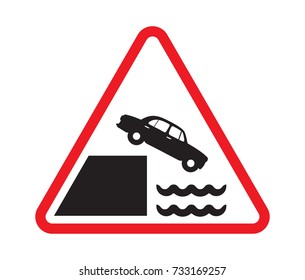 Road sign car falling into water