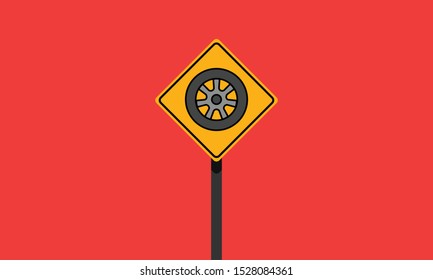 Road Sign With Car Tyre