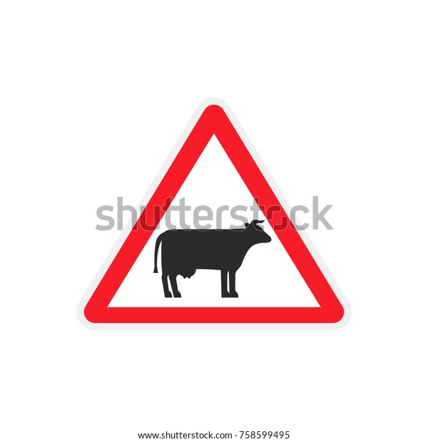 a road sign with a
cow