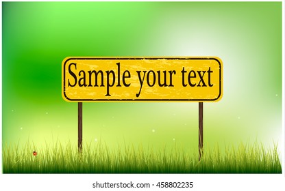 Road sign on grass