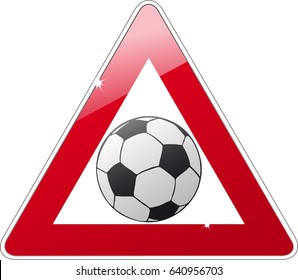 road sign showing pay attention of soccer ball