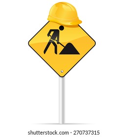 road sign and worker helmet