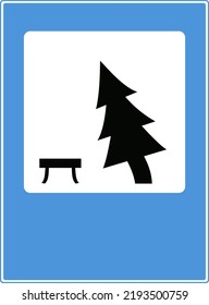 Road signs of the service. A place of rest. Tree and stump. Vector image on a blue background.