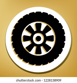 Road tire sign. Vector. Black icon with light brown shadow in white circle with shaped ring at golden background.