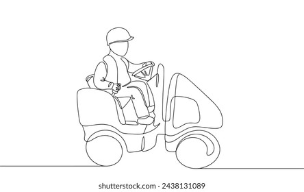 A road worker operates a road roller. Special equipment for compacting soil, asphalt and bulk construction materials. International Road Maintenance Day.