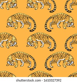 Roaring tigers, seamless pattern on orange background. Vector illustration.