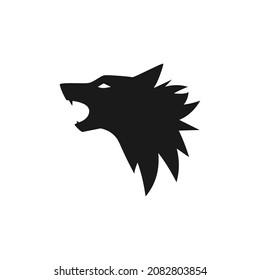 Roaring wolf  head silhouette. Vector flat animal silhouette. Wild simple logo. Free animal. Nature symbol. Fairy tale, fantasy logo. Magic label.