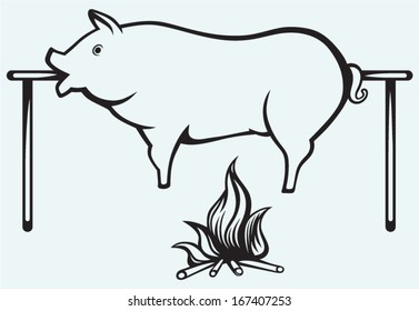 Roasted pig isolated on blue background
