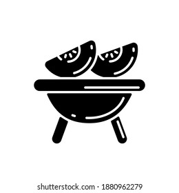 Roasted pumpkin black glyph icon. Homemade appetizer for thanksgiving. Vegetarian food, rustic cooking silhouette symbol on white space. Delicious grilled gourd pieces. Vector isolated illustration