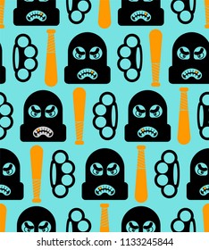 Robber pattern seamless. Burglar and brass knuckle and Baseball bat ornament. Rogue vector background