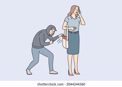 Robbery, thief and crime concept. Young man robber thief in hood trying to steal female belongings from her bag outdoors vector illustration 