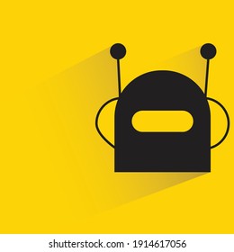 robot head with drop shadow yellow background