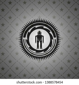 robot icon inside dark emblem