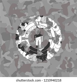 robot icon inside grey camo emblem