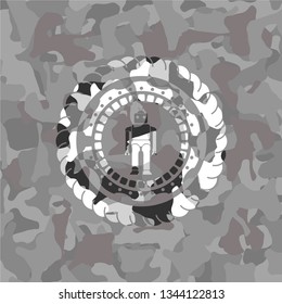 robot icon inside grey camouflage texture