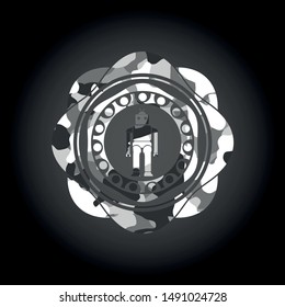 robot icon inside grey camouflage emblem
