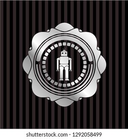 robot icon inside silver emblem