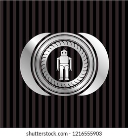robot icon inside silvery emblem