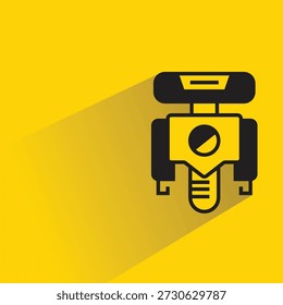 Icono de robot con sombra sobre fondo amarillo