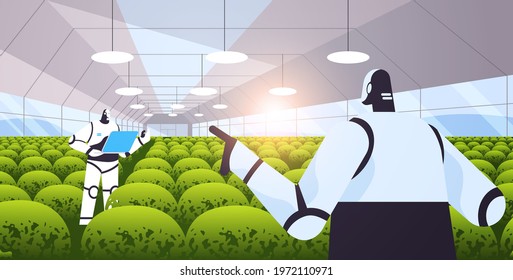 robotic agricultural engineers researching plants in greenhouse agriculture scientist artificial intelligence