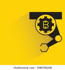 robotic arm with bitcoin icon shadow on yellow background