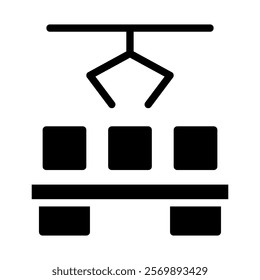 Robotic arm lifting boxes in a factory. Concept of automation, industry, and technology.
