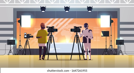 operador robótico con cámara de vídeo en trípode robot frente a seres humanos parados juntos transmitiendo el concepto de tecnología de inteligencia artificial estudio de noticias interior longitud horizontal vectorial